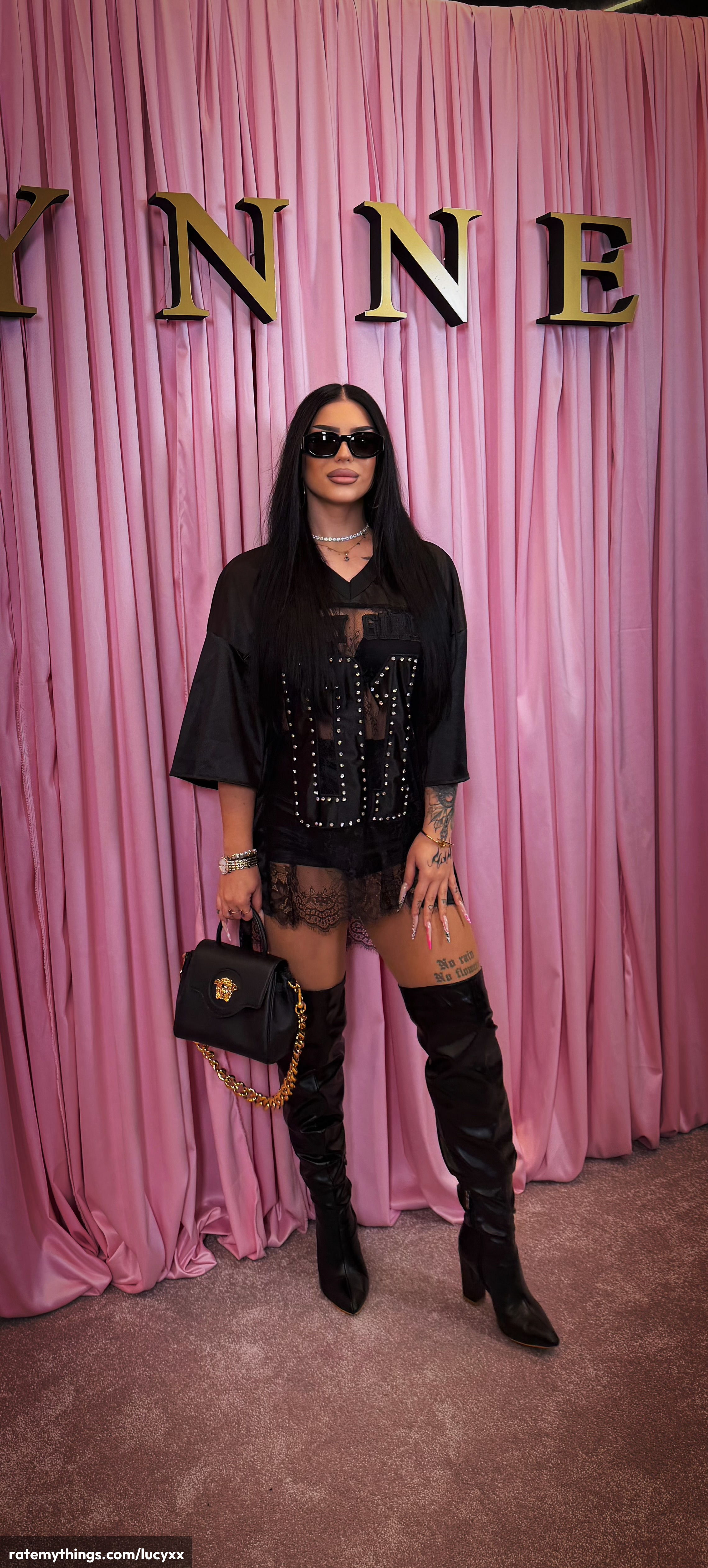 High-Impact Black Look with Strong Luxe Accessories